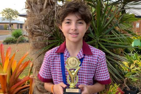 Boy Holding Award