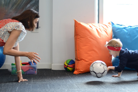 Child With Soccer Ball in OT appointment