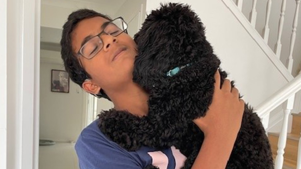 Img Vivek Cuddling His Dog