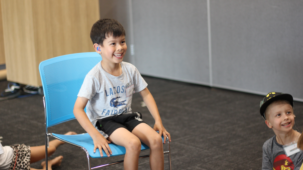 Group Program, Boy Laughing On Chair