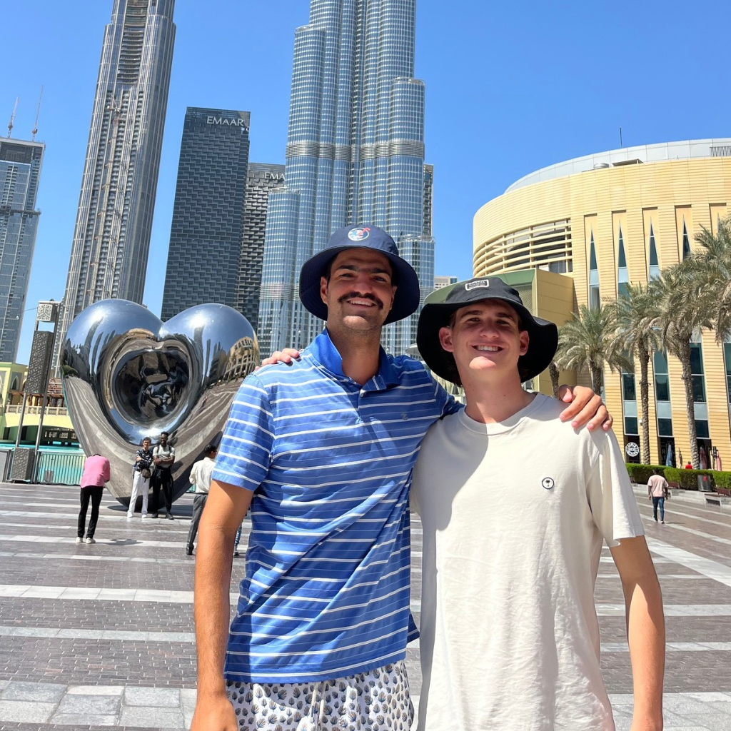 Liam posing with friend in Dubai