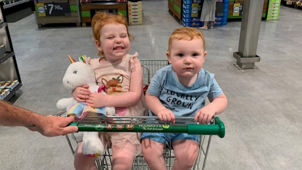 Img Kove With His Sister In A Shopping Trolley